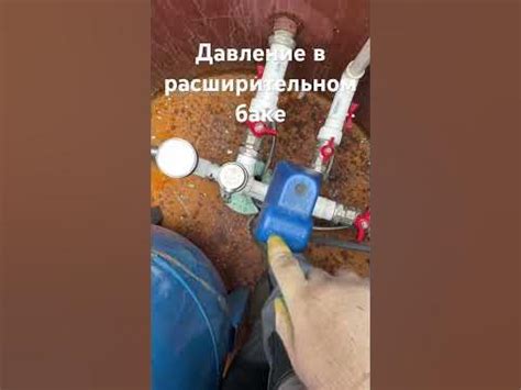 Вода в расширительном баке